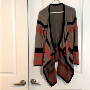 Tan, orange and blue striped cardigan.